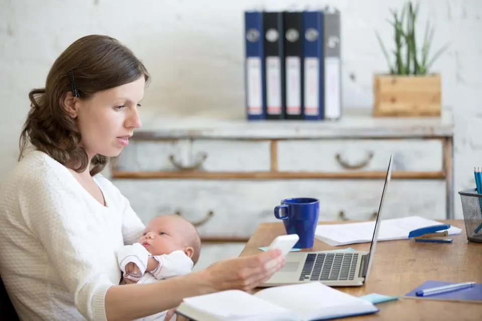 working mother with baby